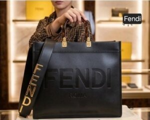 FENDI LARGE SUNSHINE TOTE BAG WITH FENDI METAL INITIAL ON SLING BELT 141